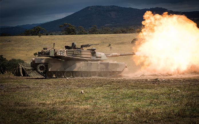 A tank firing off an explosive shot