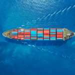 Aerial top view container ship Park for import export logistics in pier, thailand.